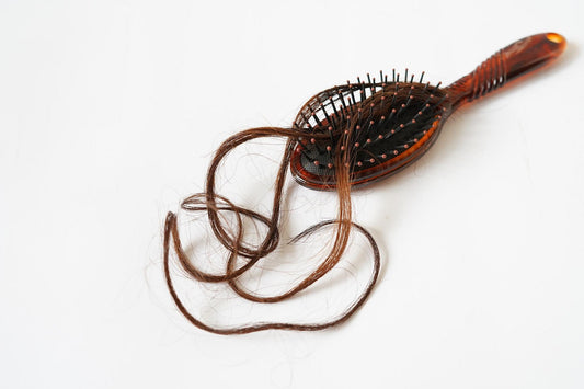 Postpartum Hair Loss - Causes & Solutions